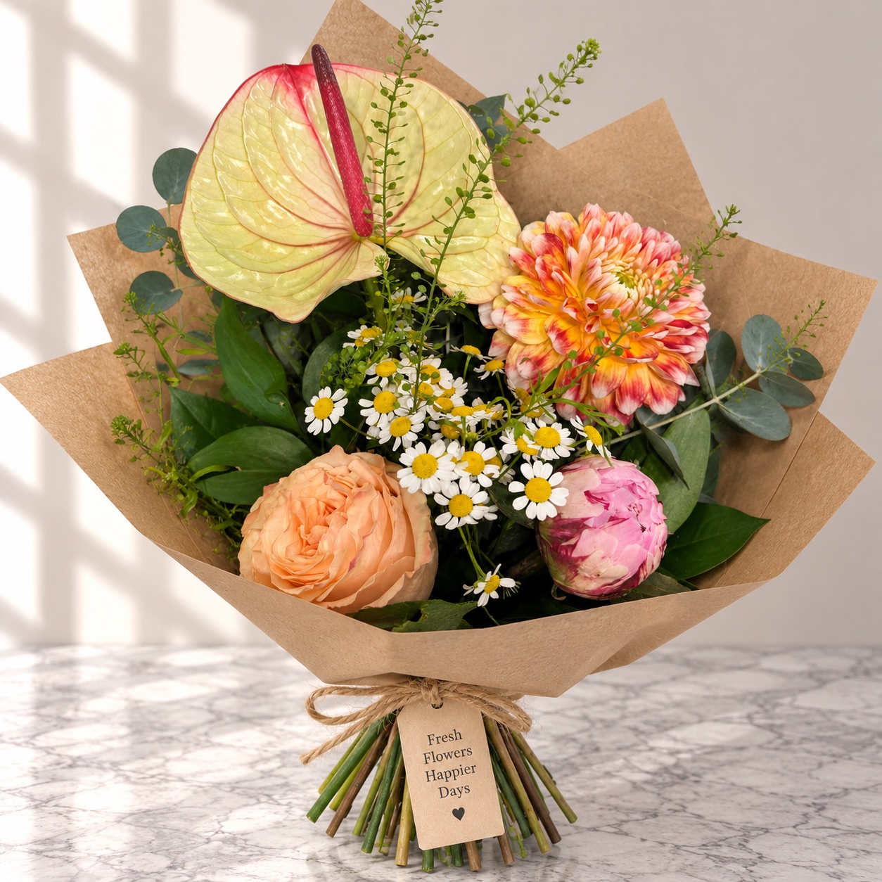 Seasonal bouquet of anthurium, dahlia, garden rose, peony and chamomile