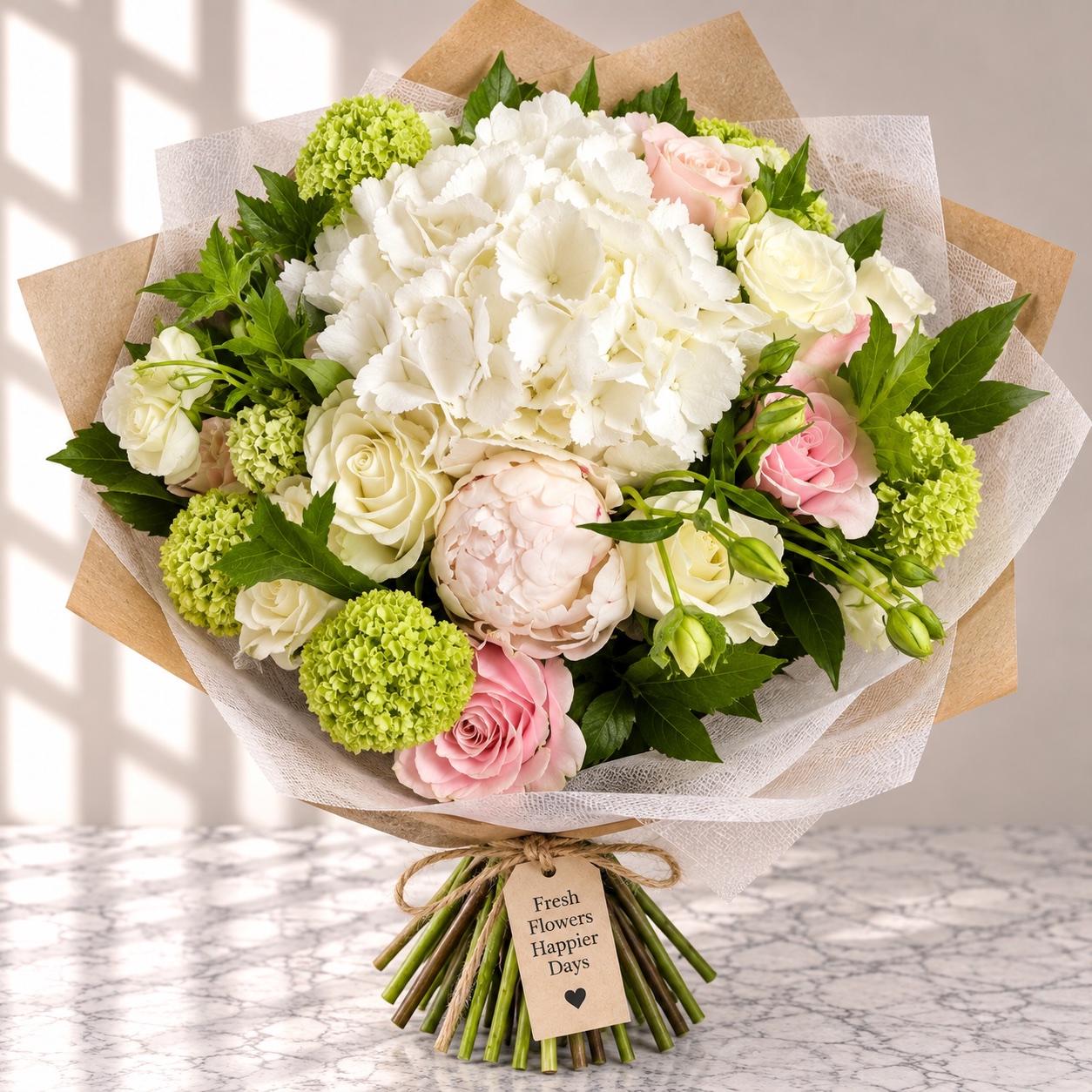 Soft bouquet of white hydrangea, blush peony, pink roses and green viburnum